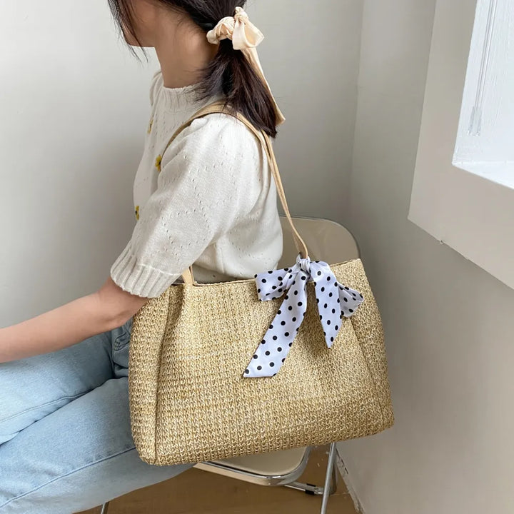 SOLINE – Woven Summer Bag with Leather Details & Bow Accent