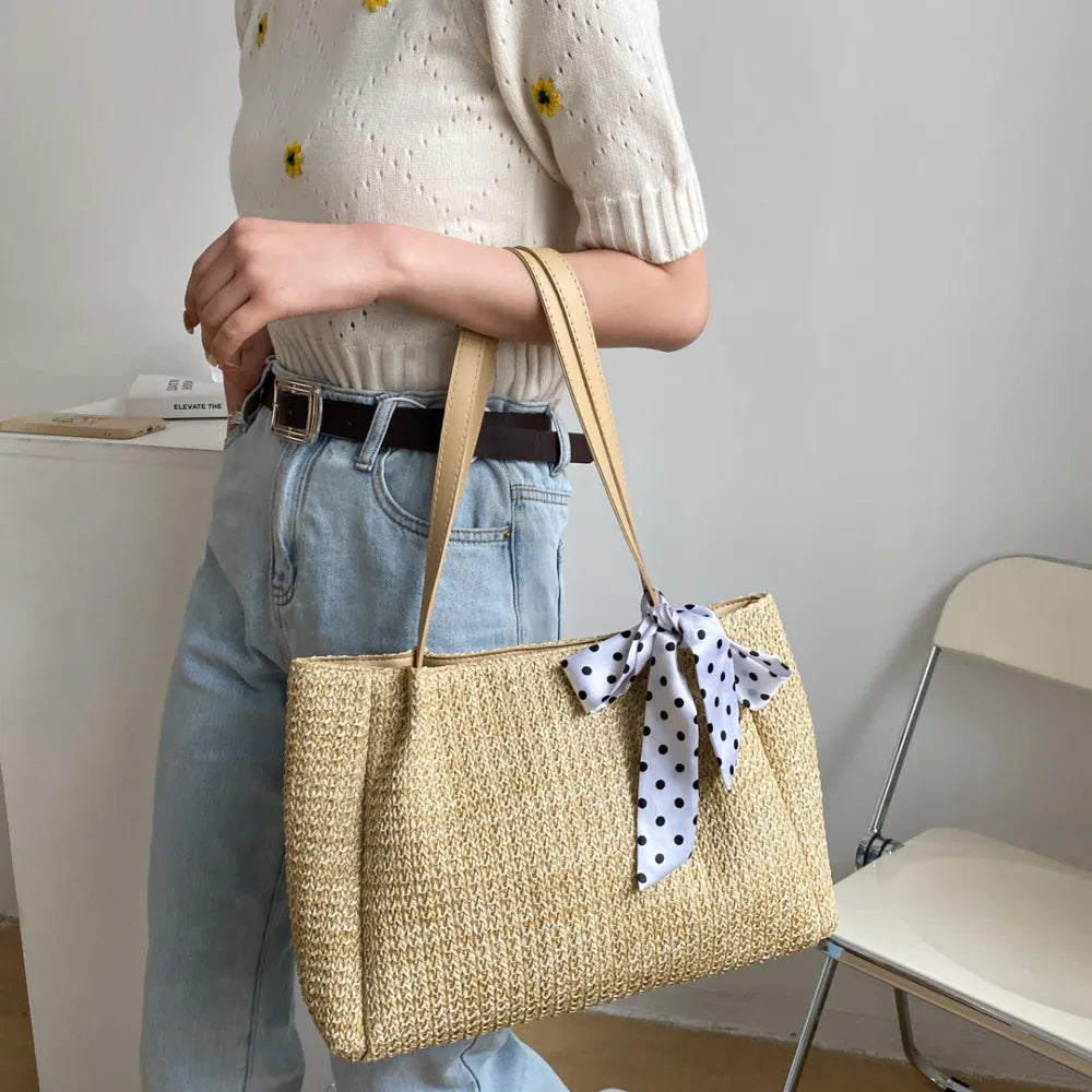 SOLINE – Woven Summer Bag with Leather Details & Bow Accent