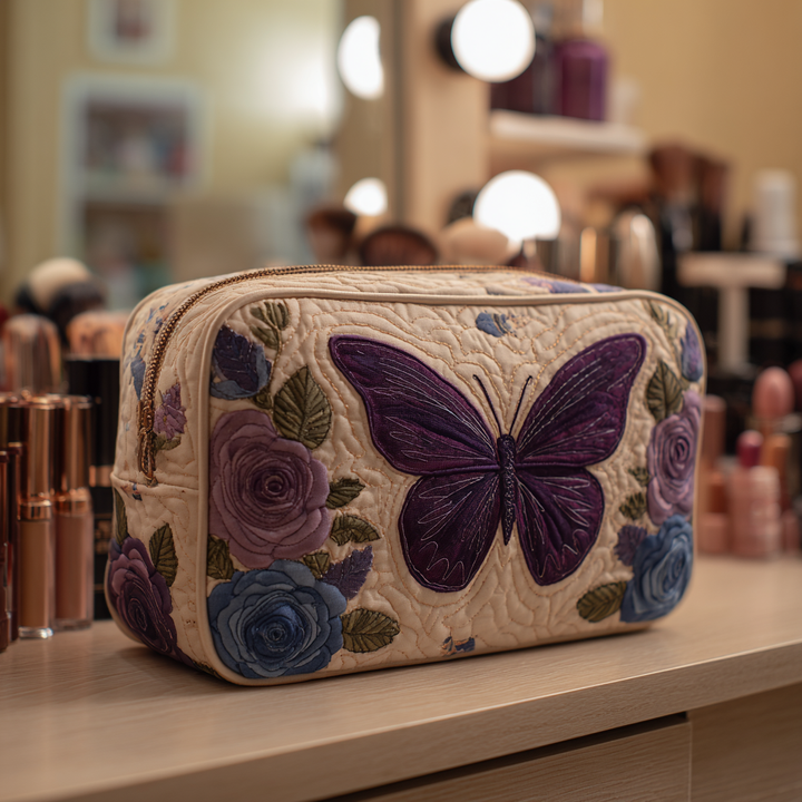 Bessie – Gewatteerde toilettas met vlinder op patchwork
