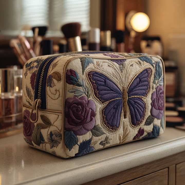 Camille – Gewatteerde toilettas met geborduurde vlinders en bloemen